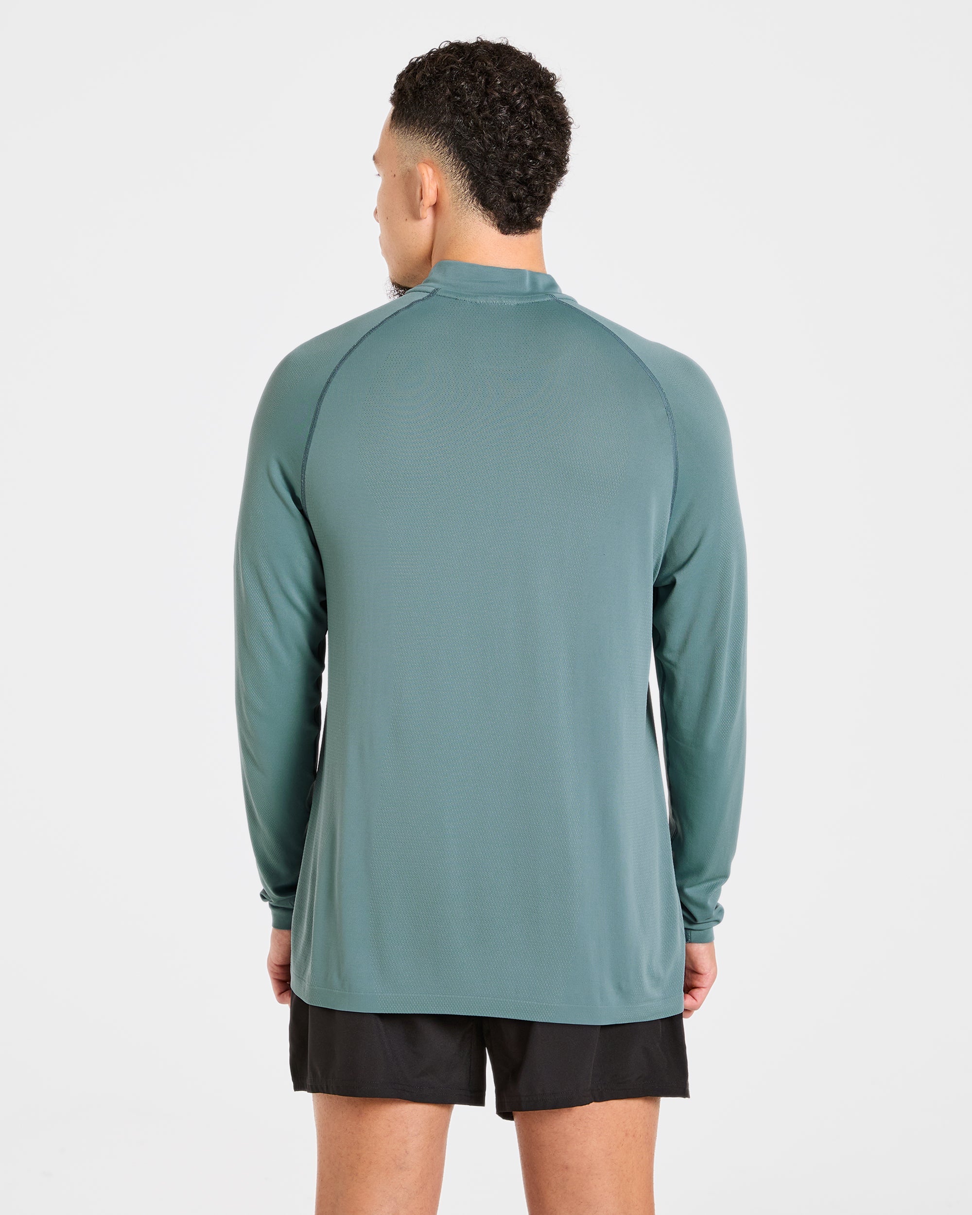 Attain Seamless 1/2 Zip Pullover - Titan Blauw