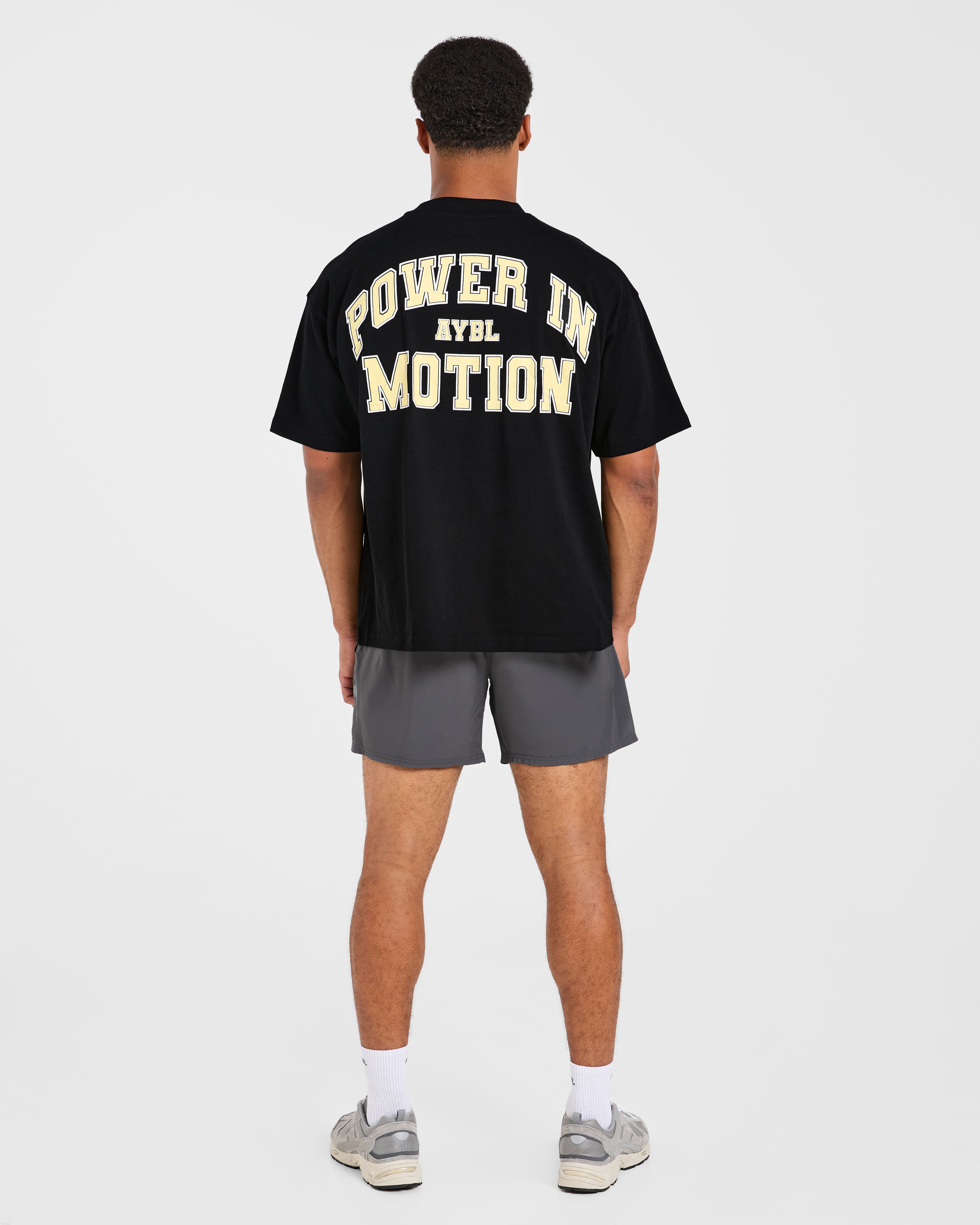 Power In Motion Oversized T Shirt - Zwart/Geel