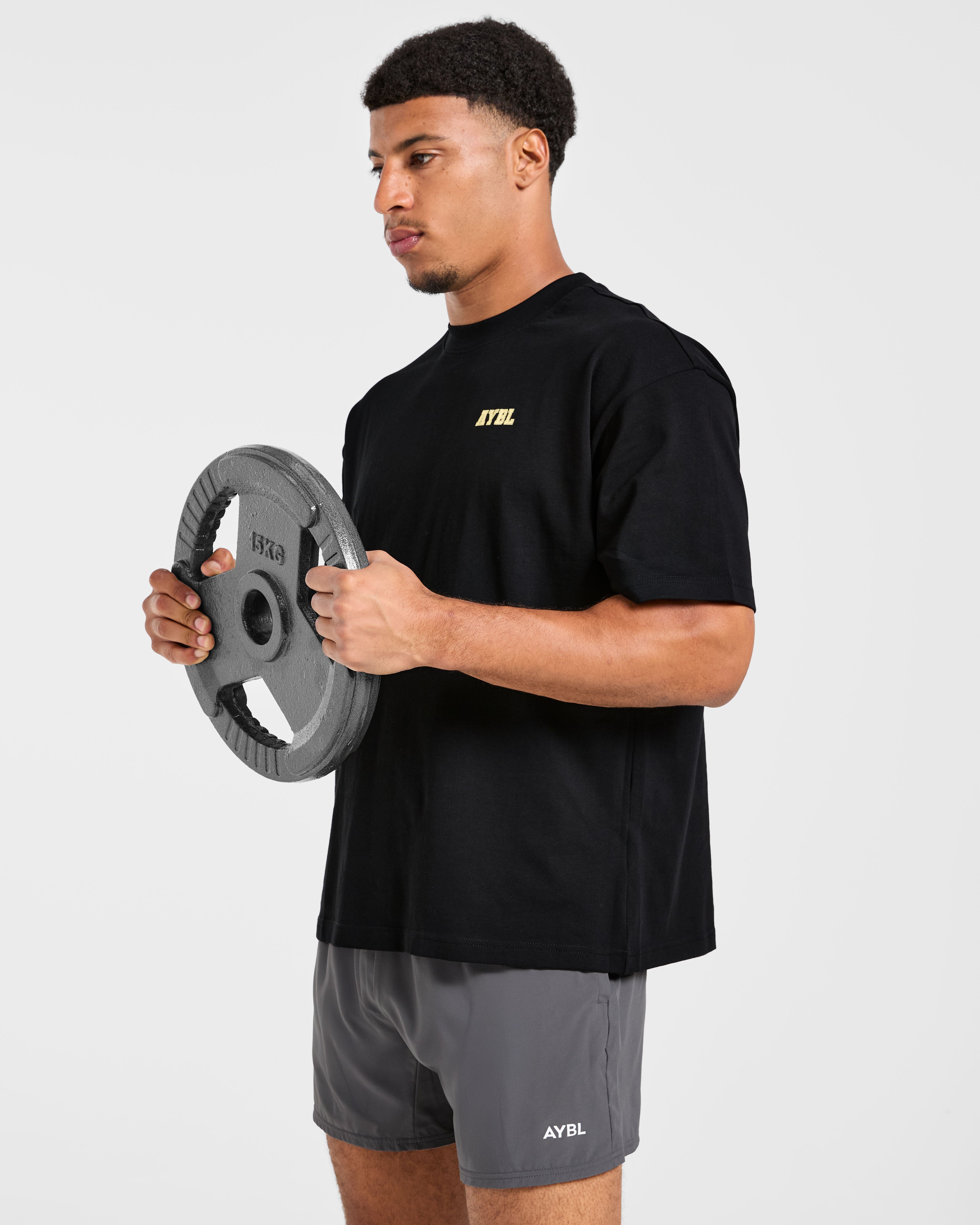 Power In Motion Oversized T Shirt - Zwart/Geel