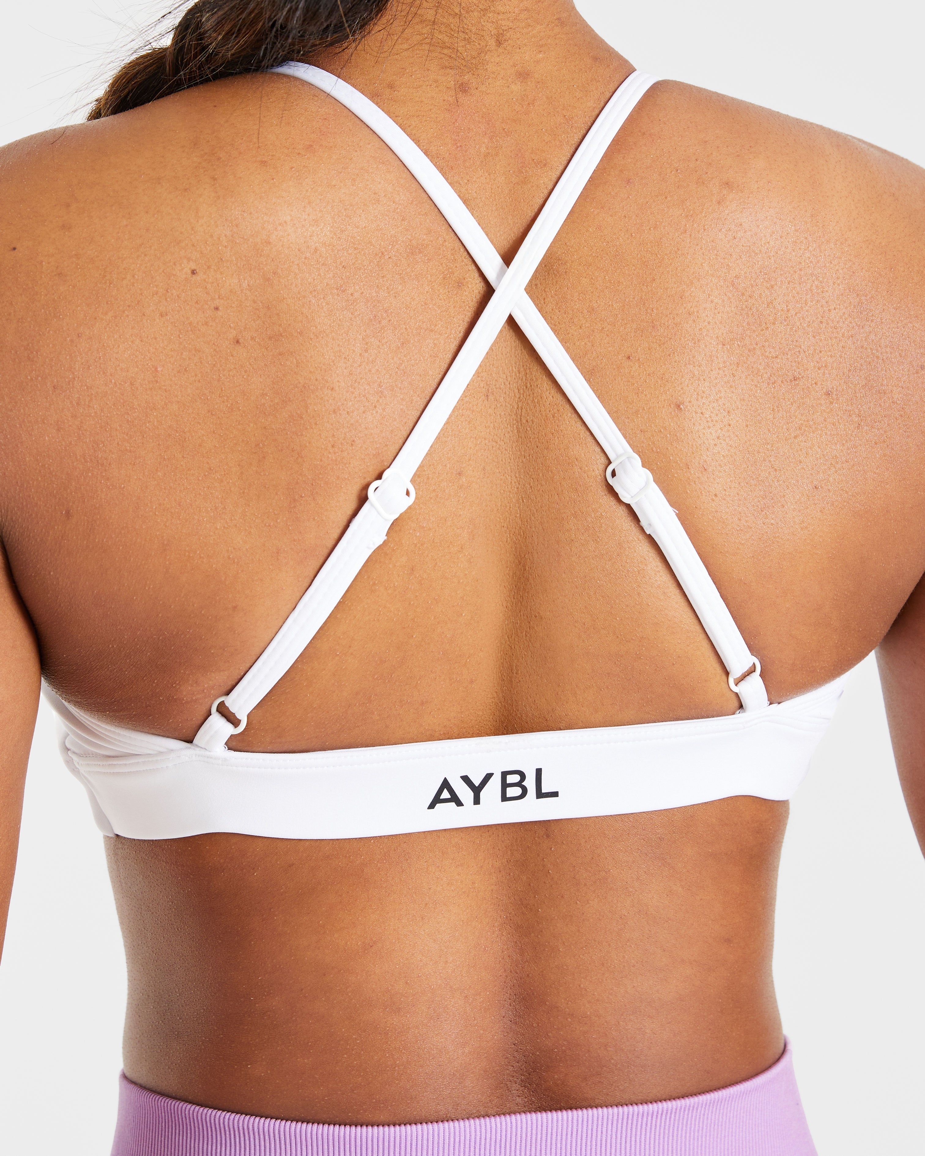 Essential Twist Crossback Sports Bra - Wit
