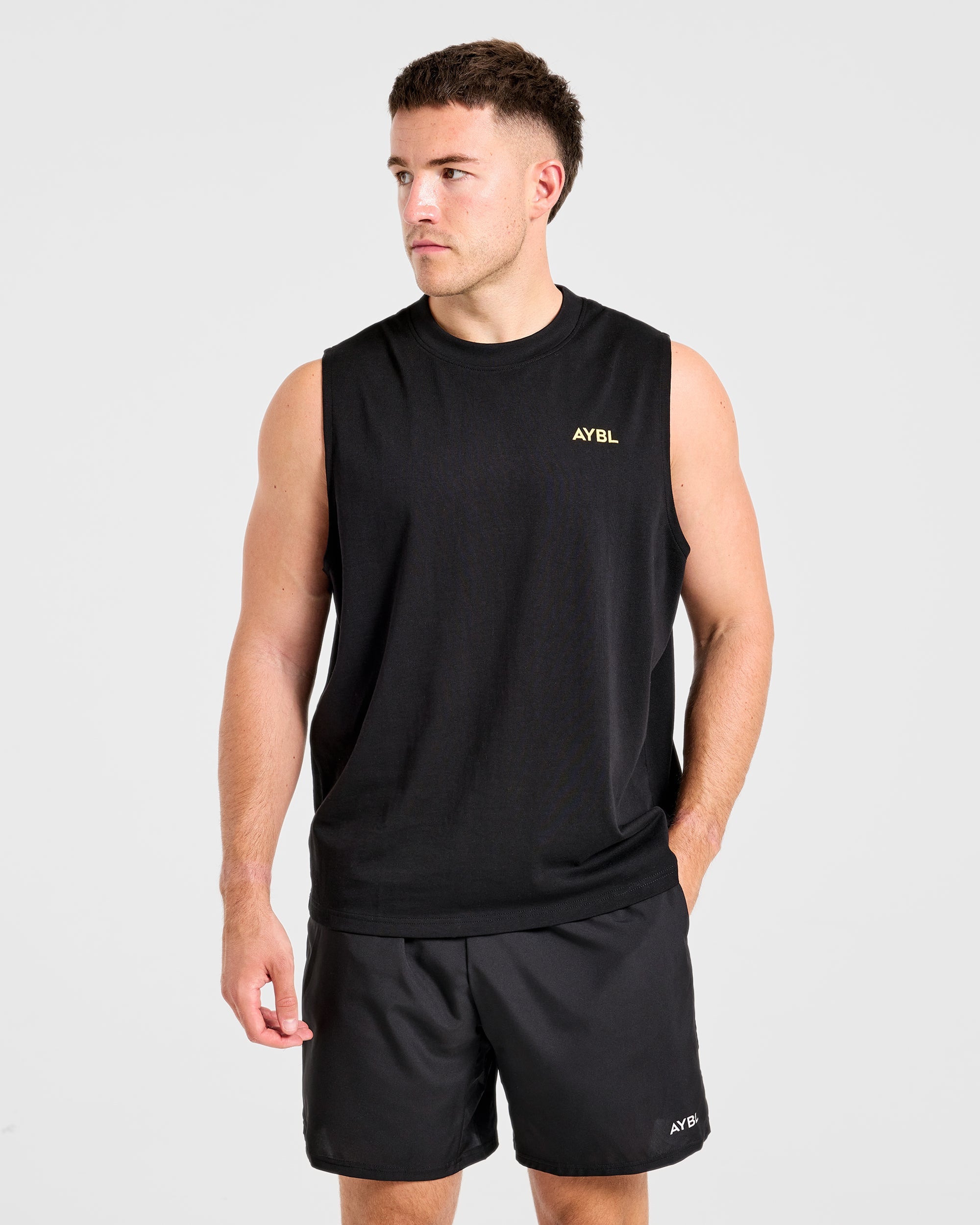 Essential Oversized Graphic Tank - Zwart/Geel
