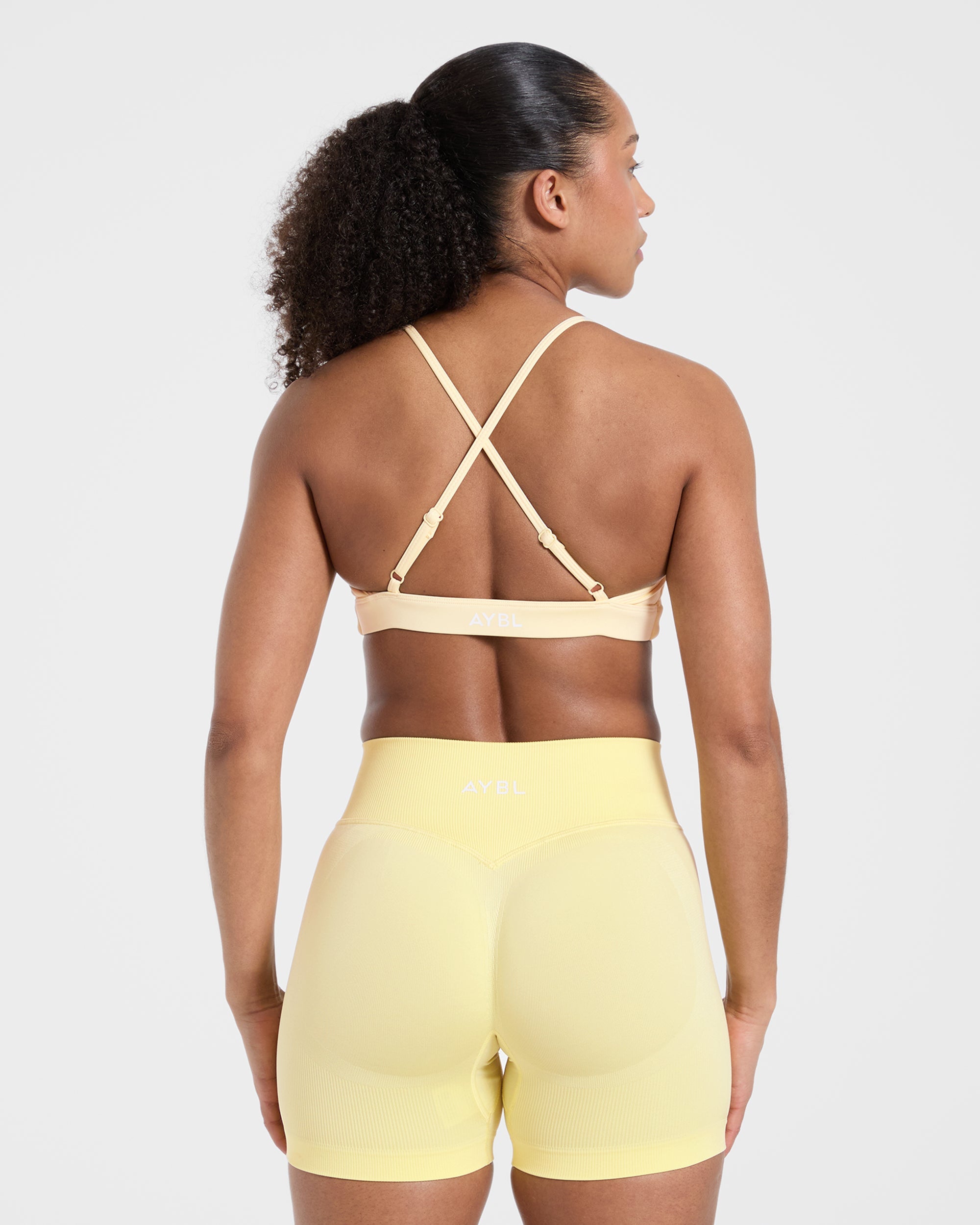 Essential Twist Crossback Sports Bra - Geel