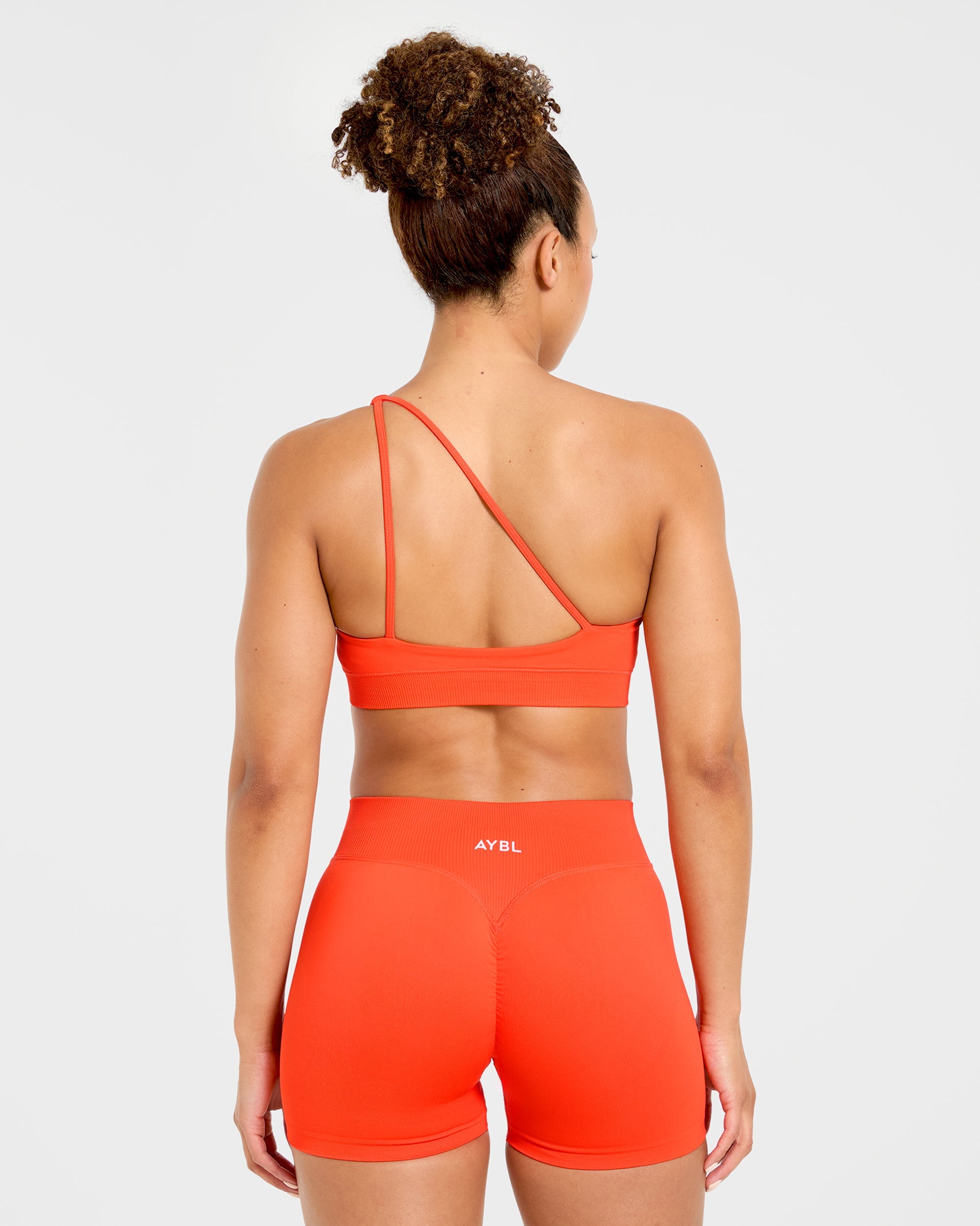 Enhance Seamless One Shoulder Sports Bra - Summer Oranje
