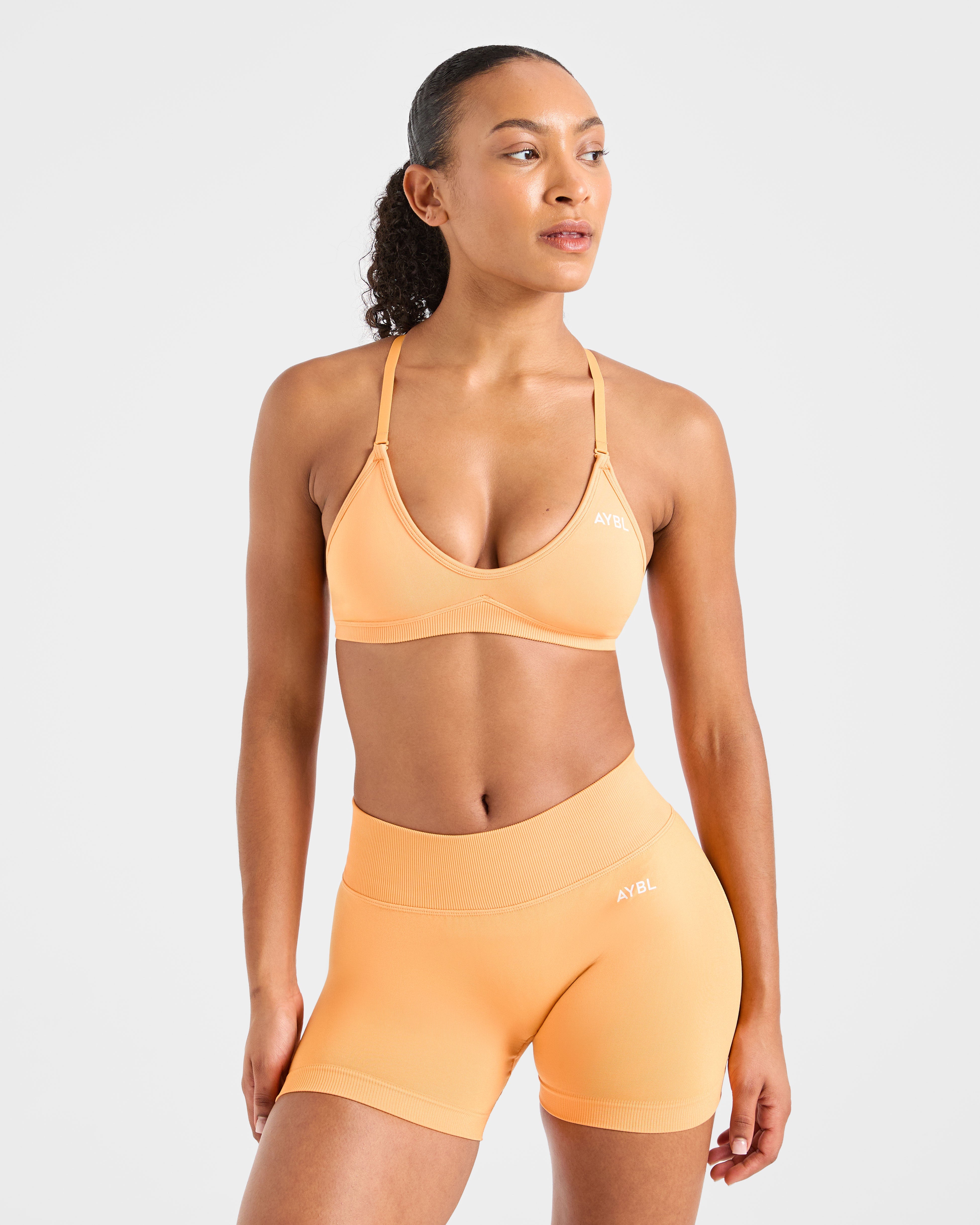 Adapt Seamless Strappy Sports Bra - Bright Oranje