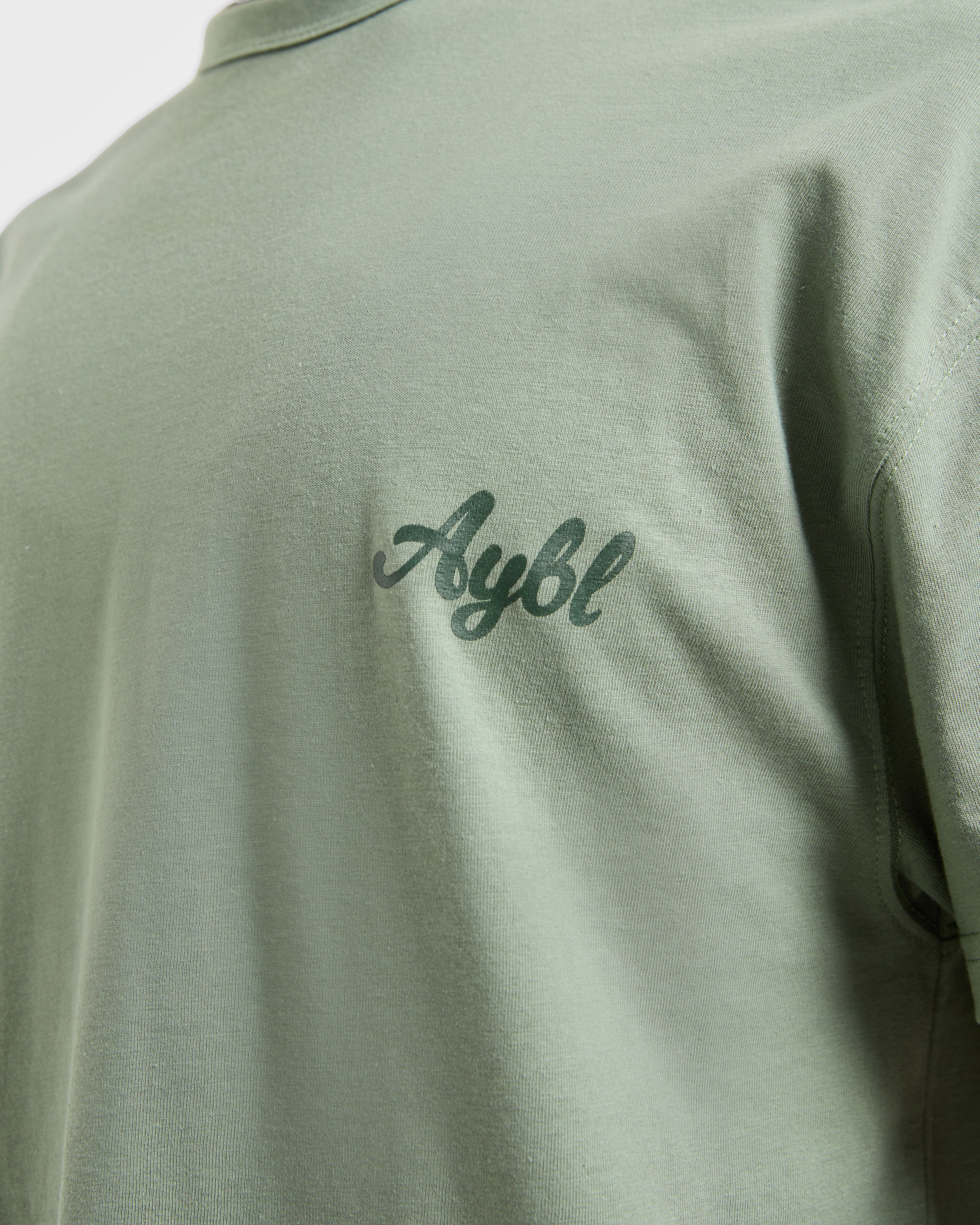 Body Achieve Mind Believe Oversized T Shirt - Groen