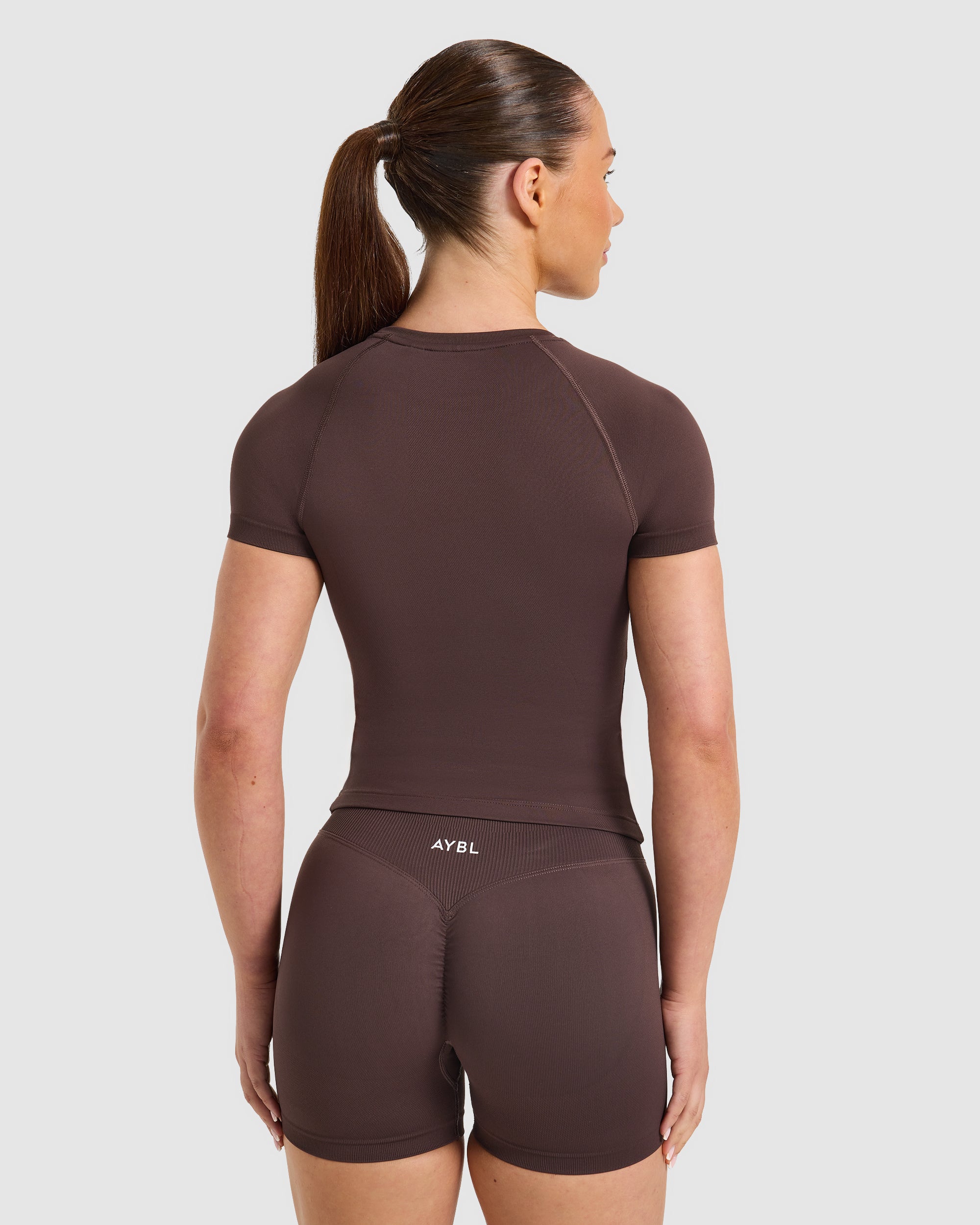 Enhance Seamless Short Sleeve Top - Cocoa Bruin