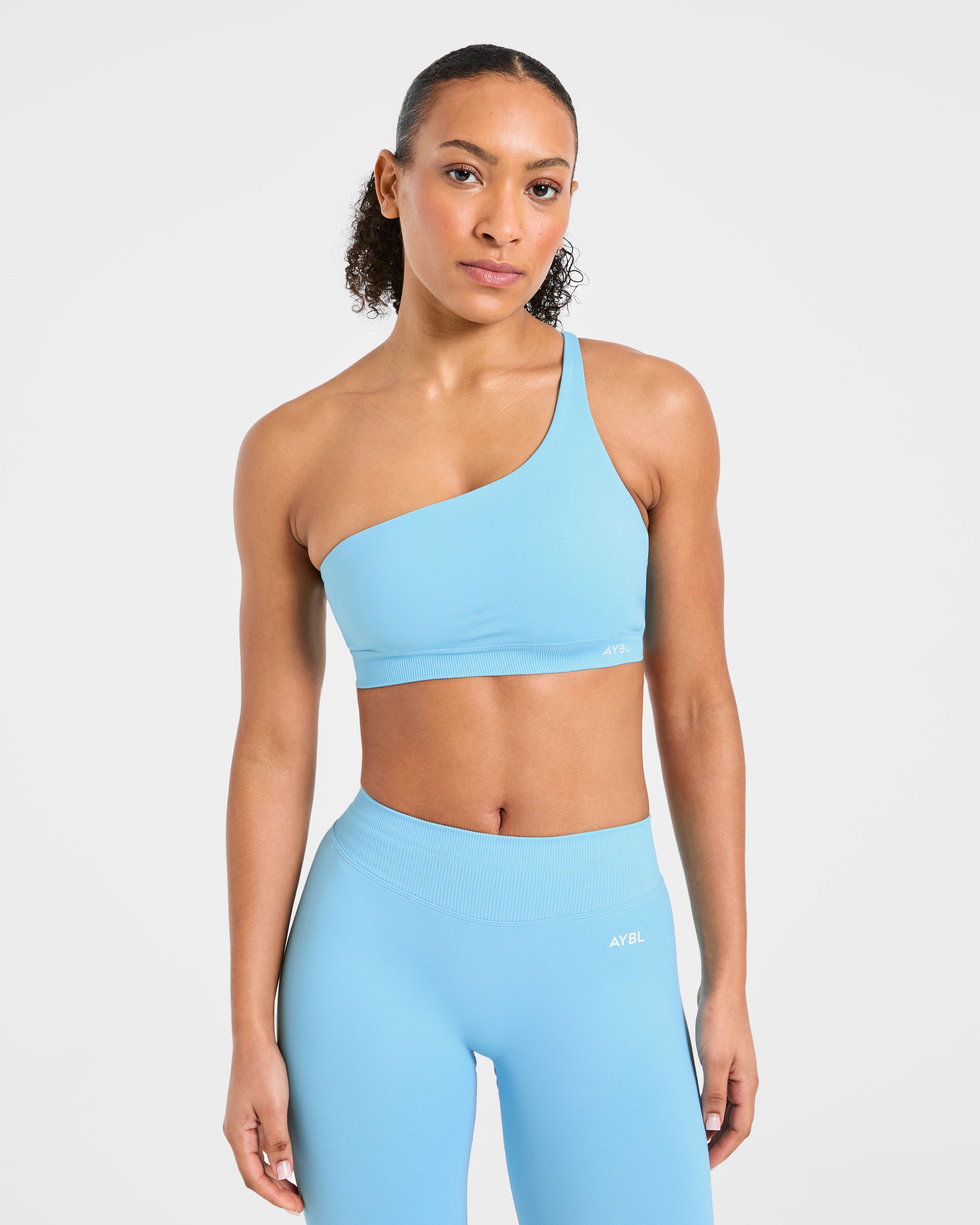 Enhance Seamless One Shoulder Sports Bra - Powder Blauw