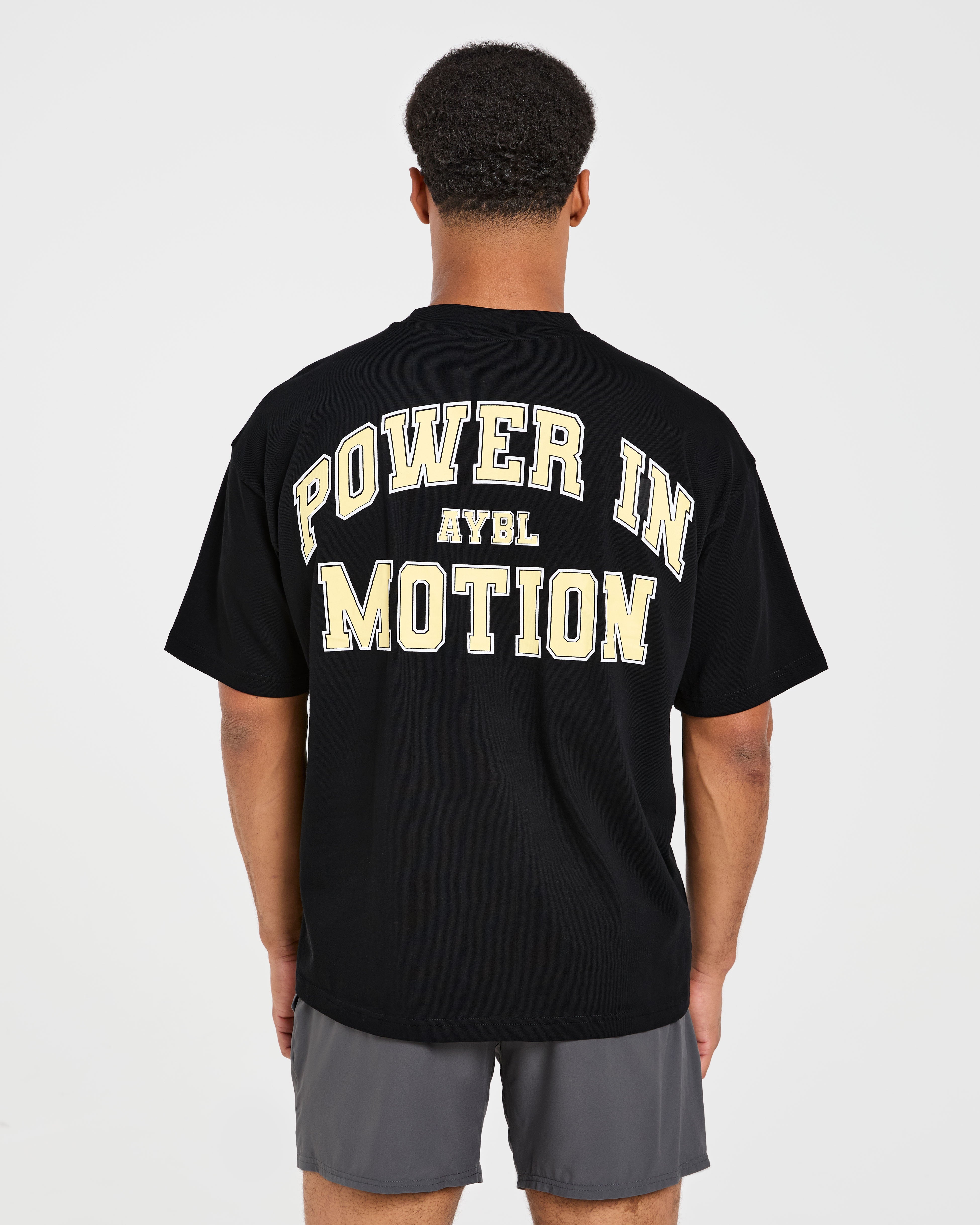 Power In Motion Oversized T Shirt - Zwart/Geel