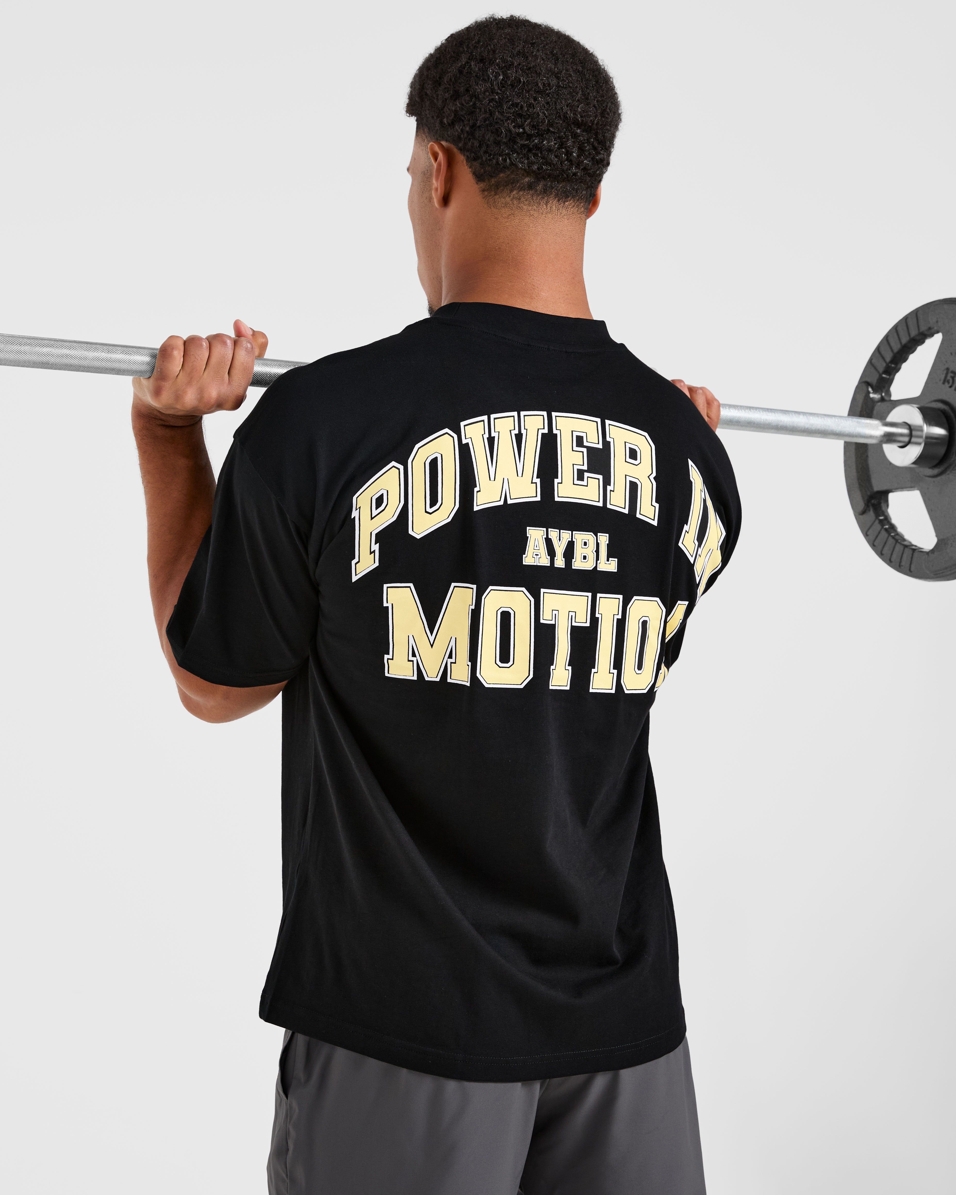 Power In Motion Oversized T Shirt - Zwart/Geel