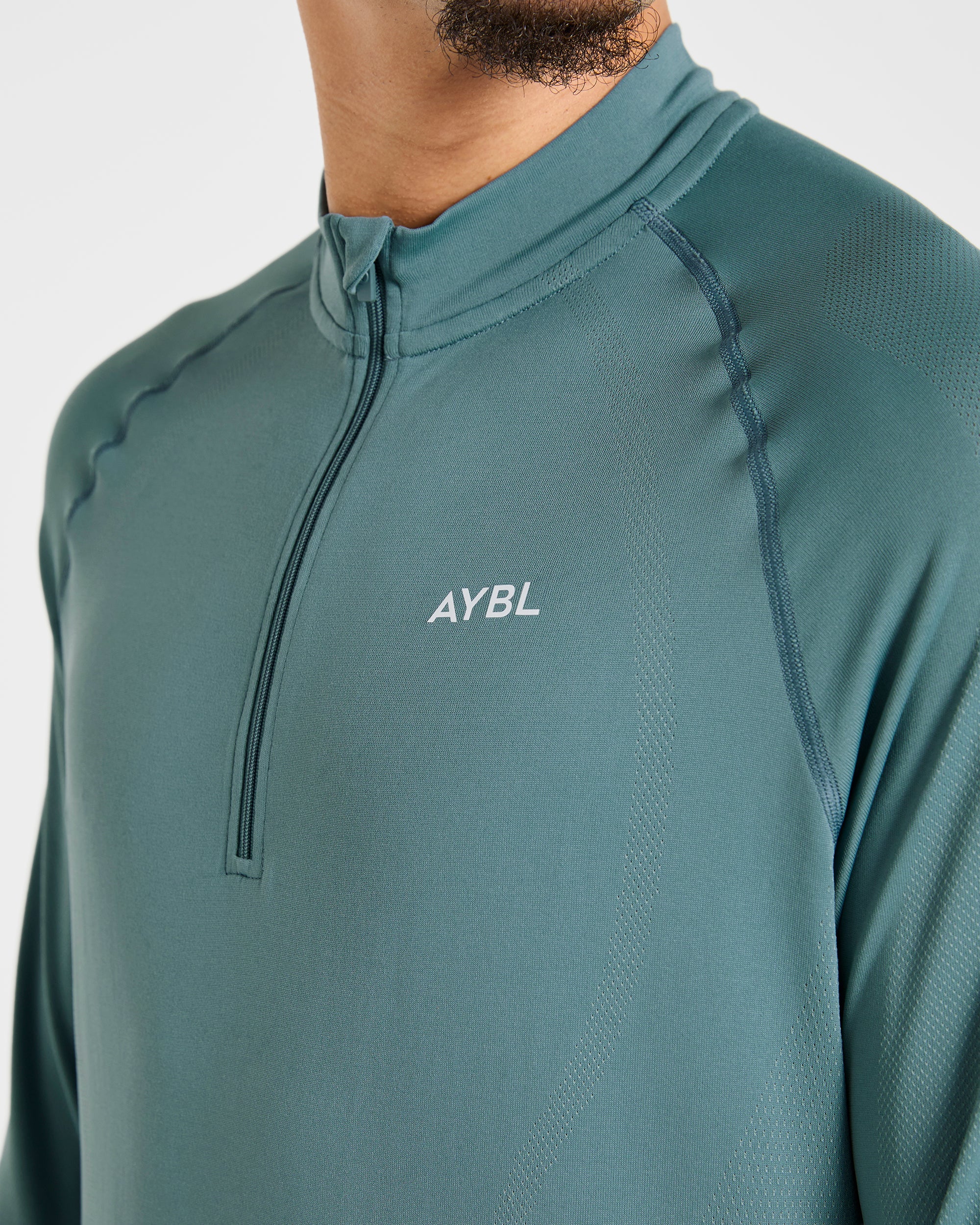 Attain Seamless 1/2 Zip Pullover - Titan Blauw