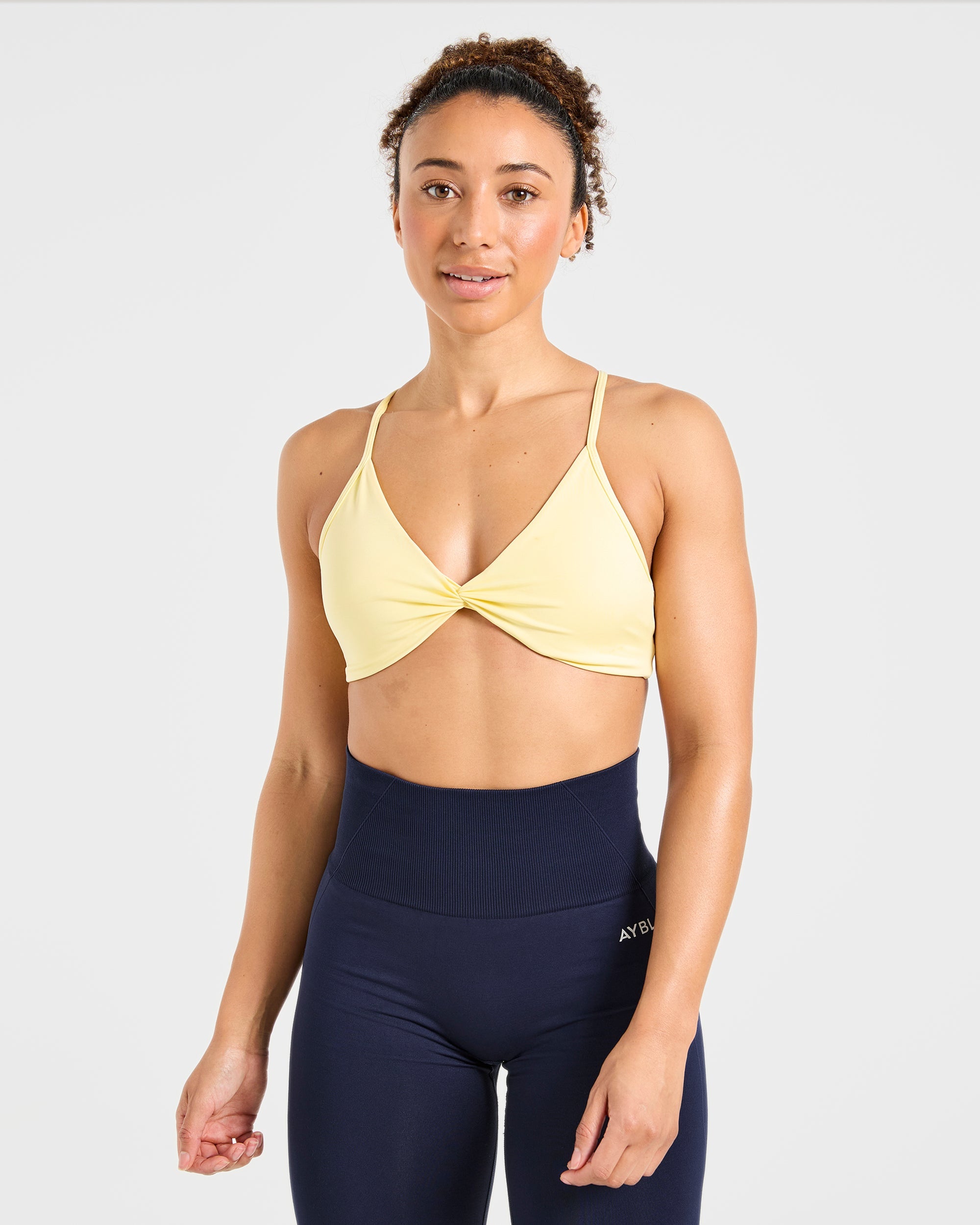 Essential Twist Crossback Sports Bra - Geel