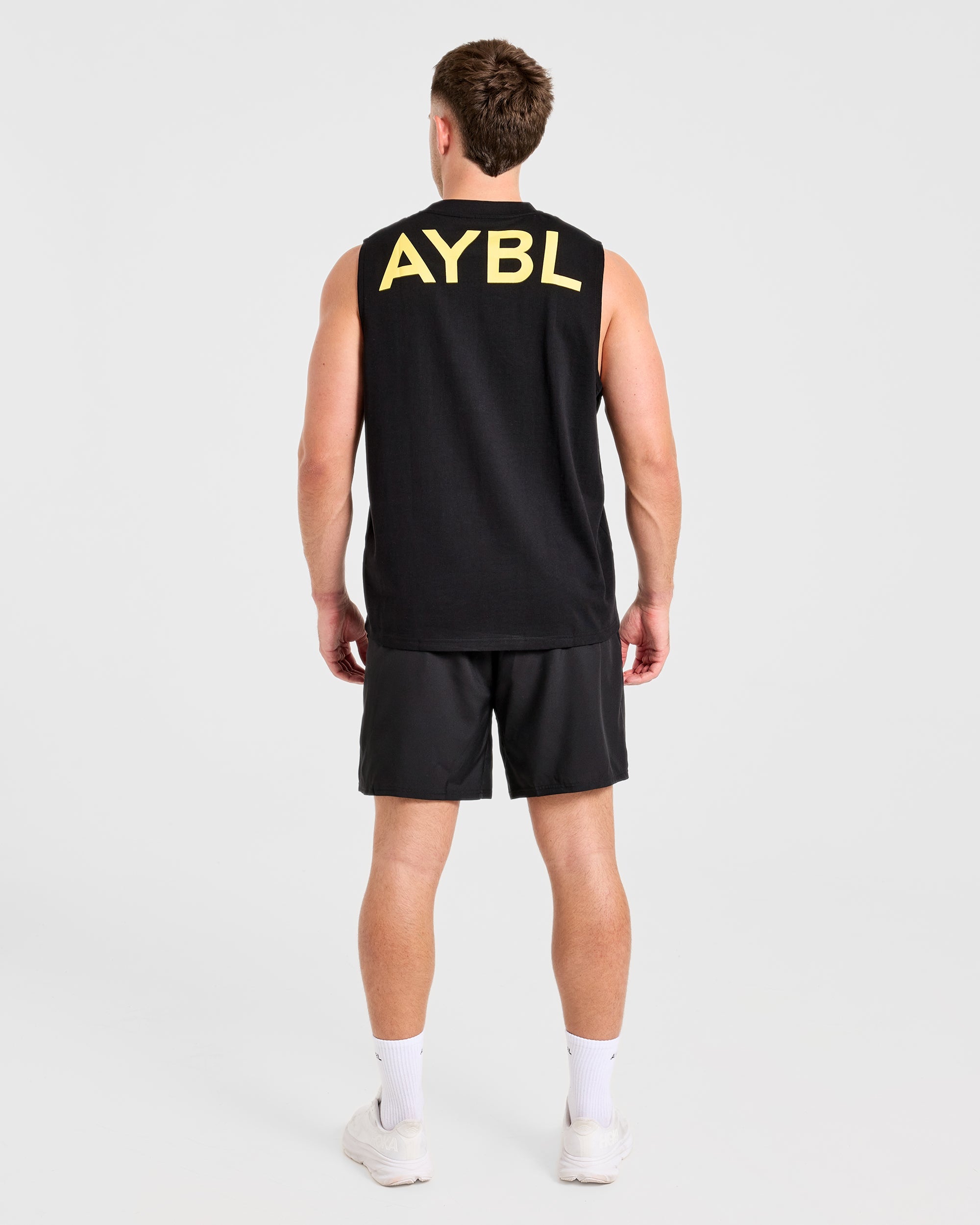 Essential Oversized Graphic Tank - Zwart/Geel