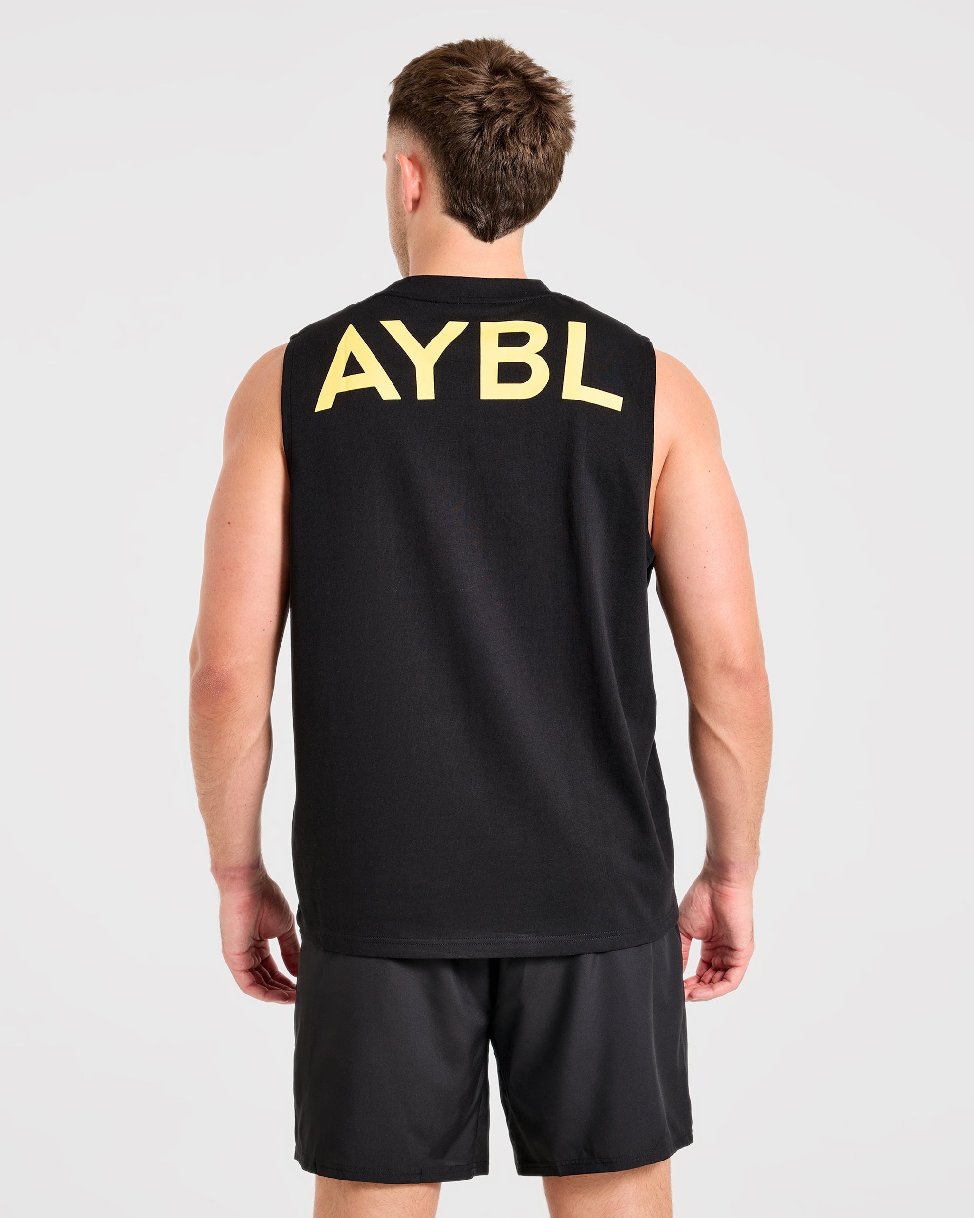 Essential Oversized Graphic Tank - Zwart/Geel