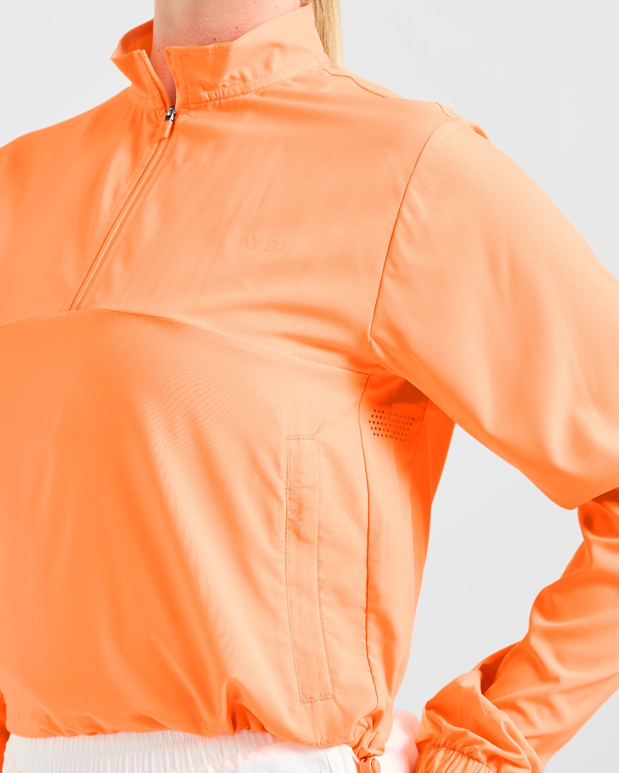 Run 1/2 Zip Jacket - Vibrant Apricot
