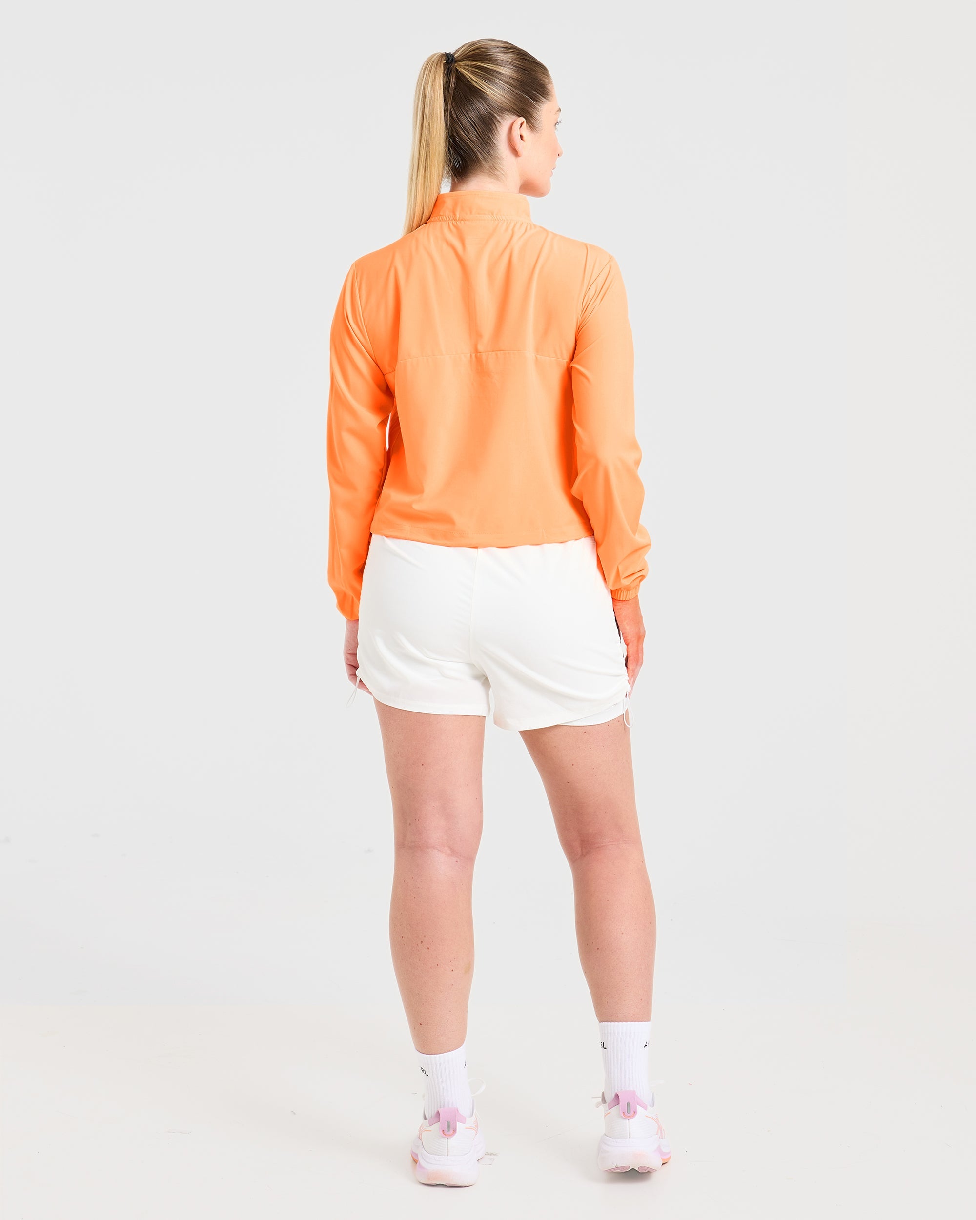 Run 1/2 Zip Jacket - Vibrant Apricot